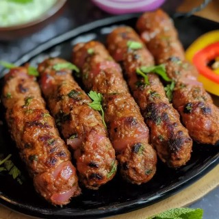 Freshly grilled mixed kebabs on skewers