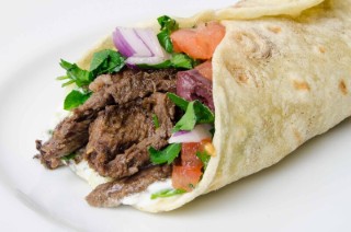 Juicy shawarma cooking on spit